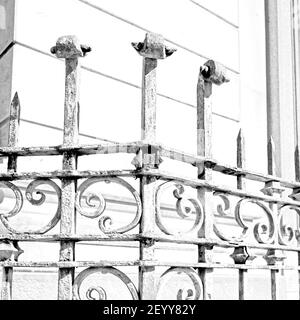 Rusty balauster acces  abstract handrail in the white concrete wall and shadow Stock Photo