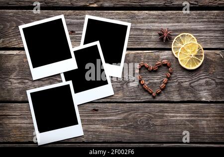 Four blank instant photo frames with coffee beans Stock Photo