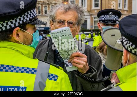 London, UK. 6th Mar, 2021. Piers Corbyn (pictured as he is arrested) and a small team of supporters arrives under the guise of campaigning for the Mayoral elections with the strap line 'Let London Live' - The great reopening protest on Richmond Green. An anti vaccination anti lockdown protest during the latest full lockdown. Led by Stand Up X, they claim the vaccines are untested and the coronavirus pandemic is a hoax and that lockdown is an infringement of their civil liberties. Credit: Guy Bell/Alamy Live News