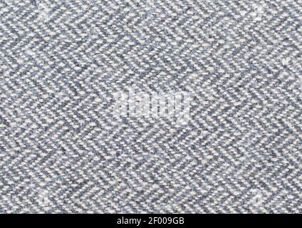 Full frame grey and cream herringbone fabric background with copyspace Stock Photo
