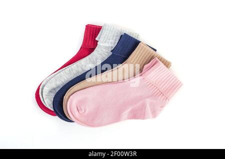 Set of womens multicolored cotton socks with medical rubber band isolated on white background, comfortable clothes for home and sports Stock Photo