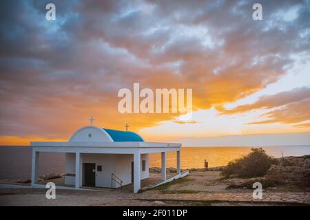 Agioi Anargyroi church at Cape Greco sunrise Mediterranean Sea coast Cyprus. Stock Photo