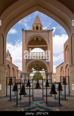Isfahan, Iran - 04.19.2019: Exterior of the Vank Armenian Christian church in Isfahan, Iran. Iron bells in the front. Stock Photo