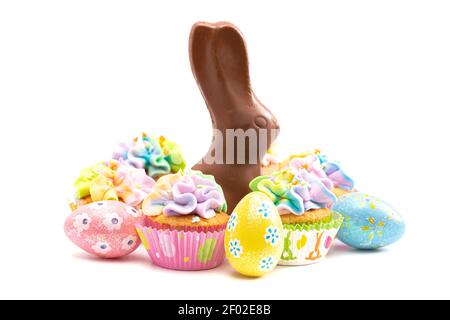 Chocolate Easter Bunny and Cupcakes Isolated on a White Background Stock Photo