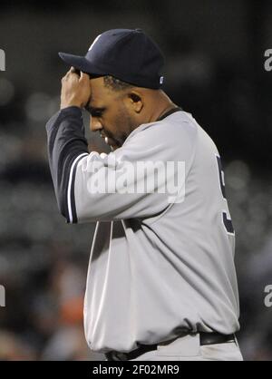 A tattoo is seen on Baltimore Orioles' Robert Andino's arm before a  baseball game against the New York Yankees in Baltimore, Monday, April 9,  2012. (AP Photo/Patrick Semansky Stock Photo - Alamy