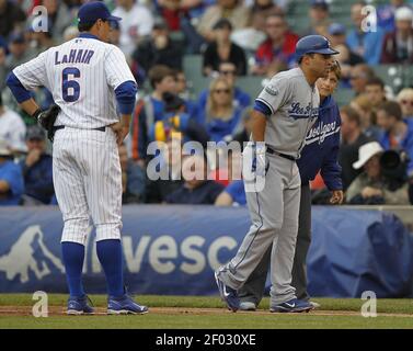 Chicago Cubs first baseman Bryan LaHair, right, celebrates with Starlin  Castro, after the pair scored on LaHair's game tying, two-run home run, off  Cincinnati Reds starting pitcher Mike Leake, during the ninth