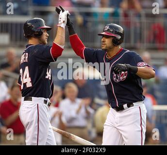 Washington Nationals' Ian Desmond gets his grip on his bat during the  seventh inning of an interleague baseball game against the Chicago White  Sox at Nationals Park ,Wednesday, April 10, 2013, in