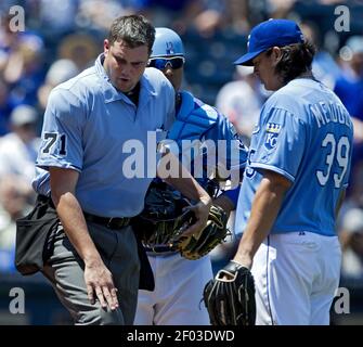 Photo: Home Plate Umpire Jordan Baker Talks To St. Louis Cardinals