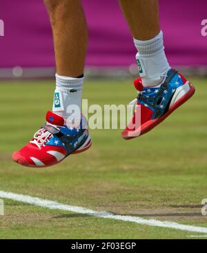 Andy Roddick of the United States wore flag themed tennis shoes