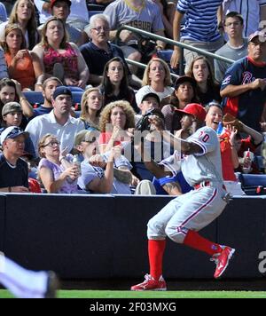 Philadelphia Phillies' Juan Pierre hit an infield single in the