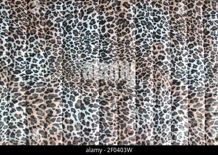 Fashionable leopard-print quilted fabric. Abstract background with leopard pattern Stock Photo