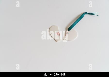 state of mind: a broken heart on white background Stock Photo