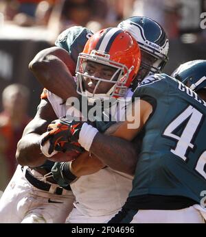 Cleveland Browns Trent Richardson is stopped by Philadelphia Eagles' DeMeco  Ryans, behind, and Kurt Coleman at Cleveland Browns Stadium Sunday,  September 9, 2012 in Cleveland, Ohio. The Eagles defeated the Browns,  17-16. (