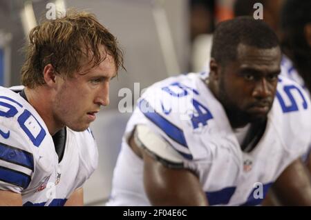 Photo: Dallas Cowboys Gerald Sensabaugh tackles New York Giants Bear Pascoe  at MetLife Stadium in New Jersey - NYP20120101112 