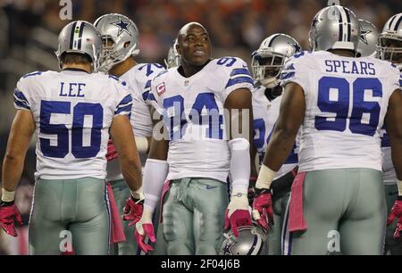 Dallas Cowboys linebacker DeMarcus Ware (94) and defensive end Jason  Hatcher (97) celebrate Ware's second sack of the first half against the New  York Giants in the NFL season opener at MetLife