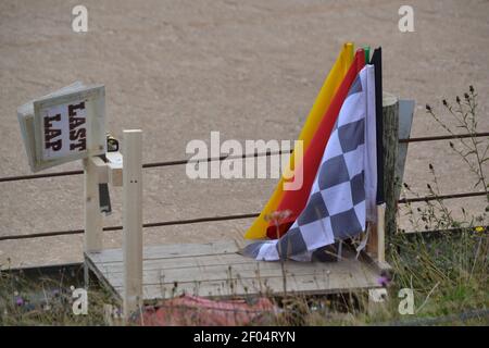 Start / Finish Marshal Post - Last Lap Board And Flags -Short Oval Grass Track Motor Racing - Hunmanby Raceway - Motorsport - Trackside -Yorkshire UK Stock Photo