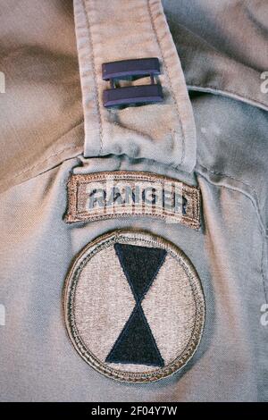 1970s U.S. Army field jacket with rank and ranger tab, USA Stock Photo