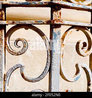 Rusty balauster acces  abstract handrail in the white concrete wall and shadow Stock Photo
