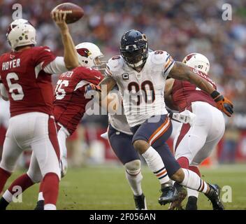 Chicago Bears defensive end Julius Peppers (90) stands on the sidelines  late in the fourth quarter against the Dallas Cowboys at Soldier Field in  Chicago on December 9, 2013. The Bears defeated