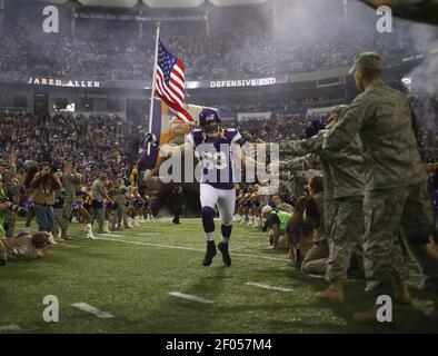 Vikings' Jared Allen carried an American flag onto Mall of America Field to  honor servicemen and women on Veterans' Day Sunday, November 11, 2012, in  Minneapolis, Minnesota. The Minnesota Vikings defeated the