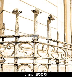 Rusty balauster acces  abstract handrail in the white concrete wall and shadow Stock Photo