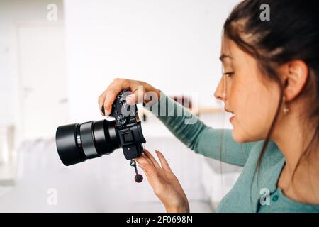 Crop unrecognizable male making purchase with plastic card for order during online shopping via laptop Stock Photo