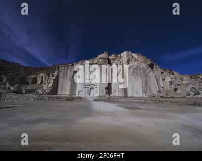 Petra lookalike sillar rhyolite white volcanic rock stone carving in Anashuayco quarry near Arequipa Peru, South America Stock Photo