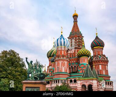 Colourful onion domes of St Basil's Cathedral & Minin and Pozharsky monument, Red Square, Moscow, Russia Stock Photo