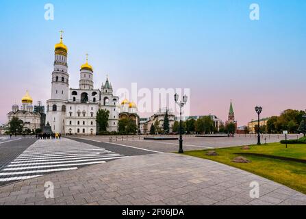 Ivanovskaya Square with gold domes of cathedrals and Ivan Great bell Tower with zebra crossing, Kremlin, Moscow, Russia Stock Photo