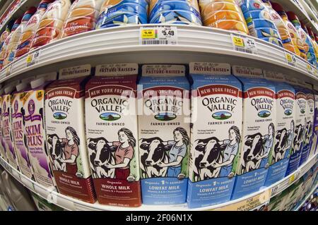 Containers of milk in a supermarket refrigerator in New York Stock Photo -  Alamy