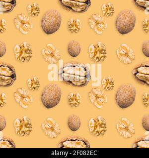 Walnut seamless pattern on brown background. Open nut shell and kernel. Top view. Banner. Pop art design.  Stock Photo