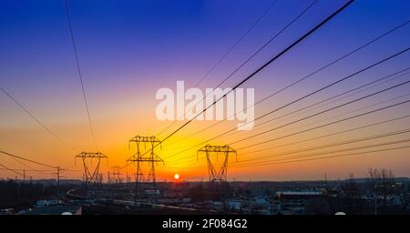 Aerial View between Electric towers with many power lines, sunrise, Pennsylvania, USA Stock Photo