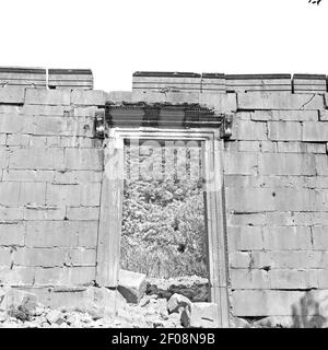 Olympos   bush gate  in  myra  the      old column  stone  construction asia greece and  roman temple Stock Photo