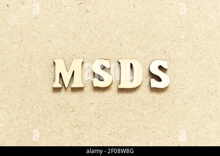 Alphabet letter in word MSDS (Abbreviation of material safety data sheet) on wood background Stock Photo