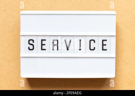 Lightbox with word service on wood background Stock Photo