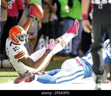 Cleveland Browns wide receiver Greg Little, left, is tackled by Miami  Dolphins cornerback Will Allen after a short gain in the fourth quarter at Cleveland  Browns Stadium in Cleveland, Ohio, Sunday, September