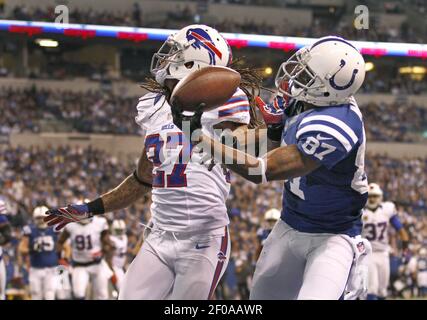 January 1, 2023, East Rutherford, New Jersey, USA: New York Giants tight  end Daniel Bellinger (82) is tackled by Indianapolis Colts safety Julian  Blackmon (32) and cornerback Stephon Gilmore (5) after a