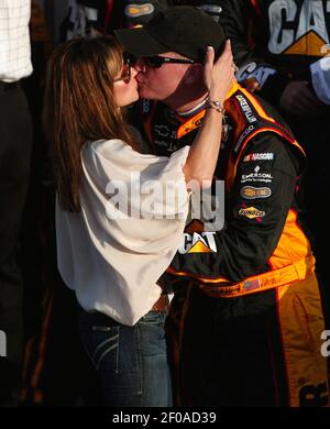 Jeff Burton kisses his wife Kim in Victory Lane after winning the