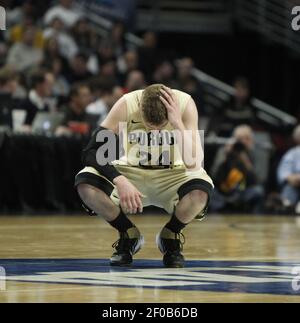 Purdue guard Ryne Smith (24) congratulates teammate Lewis Jackson, right,  during the second half against St. Peter's in the second round of the 2011  NCAA Men's Basketball Championship at the United Center