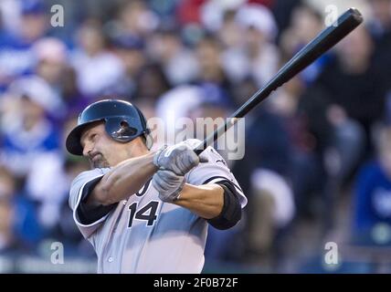 Chicago White Sox's Nick Swisher follows through on a solo homer during the  fourth inning against