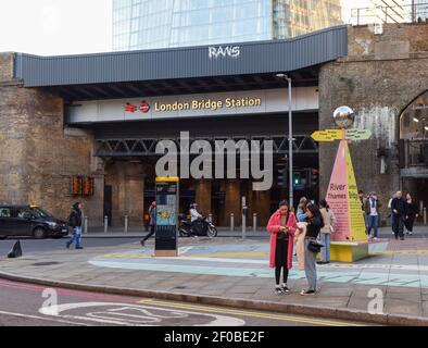 London, UK. 26th Feb, 2021. People seen in front of the entrance to London Bridge Station.London transport remains moderate during national lockdown. Credit: Petra Figueroa/SOPA Images/ZUMA Wire/Alamy Live News Stock Photo