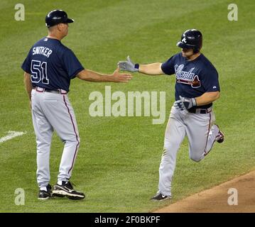 Atlanta Braves third base coach Ron Washington gestures toward a baserunner  during a baseball game against the Washington Nationals, Friday, July 15,  2022, in Washington. (AP Photo/Patrick Semansky Stock Photo - Alamy