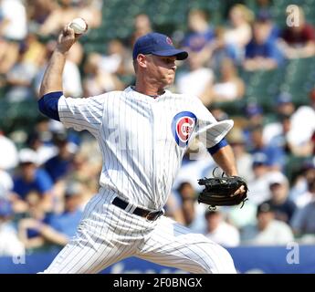 Former Chicago Cubs pitcher Kerry Wood acknowledges the crowd