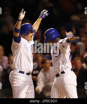 Chicago Cubs first baseman Bryan LaHair, right, celebrates with Starlin  Castro, after the pair scored on LaHair's game tying, two-run home run, off  Cincinnati Reds starting pitcher Mike Leake, during the ninth