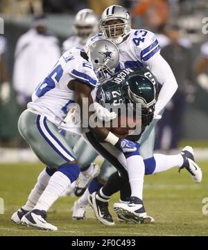 Dallas Cowboys free safety Gerald Sensabaugh (43) limps off the field in  the last seconds of the team's loss at CenturyLink Field in Seattle,  Washington, Sunday, September 16, 2012. The Seattle Seahawks