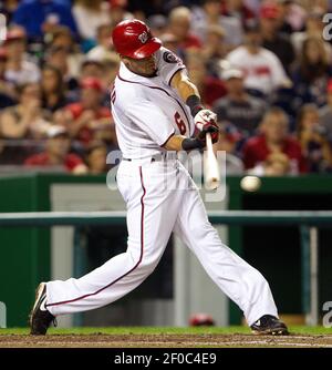 Washington Nationals' Ian Desmond gets his grip on his bat during the  seventh inning of an interleague baseball game against the Chicago White  Sox at Nationals Park ,Wednesday, April 10, 2013, in