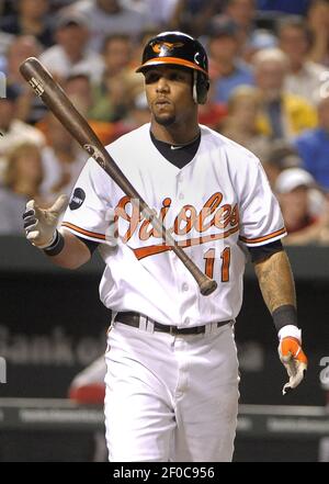 A tattoo is seen on Baltimore Orioles' Robert Andino's arm before a  baseball game against the New York Yankees in Baltimore, Monday, April 9,  2012. (AP Photo/Patrick Semansky Stock Photo - Alamy