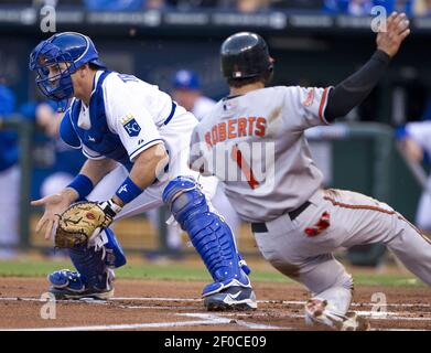 Baltimore Orioles second baseman Brian Roberts hits an RBI single that  scores catcher Paul Bako in the sixth inning against New York Yankees  pitcher Chien-Ming Wang at Orioles Park at Camden Yards