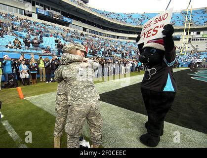 Tampa Bay Buccaneers vs. Carolina Panthers. Fans support on NFL Game.  Silhouette of supporters, big screen with two rivals in background Stock  Photo - Alamy