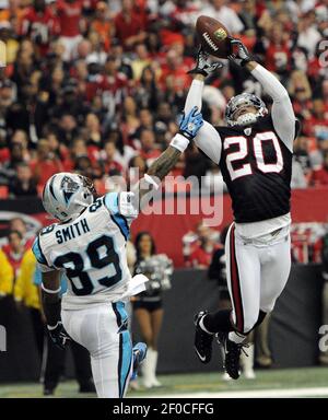 Falcons #20 Corner Back Brent Grimes up high for the ball in the game  between the Atlanta Falcons and the New York Giants at Giants Stadium,  Rutherford, New Jersey The Giants defeated